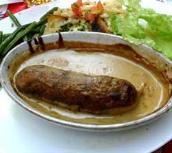 Foto 8: : Die Spezialität der lyonaisischen Küche: Andouillette 